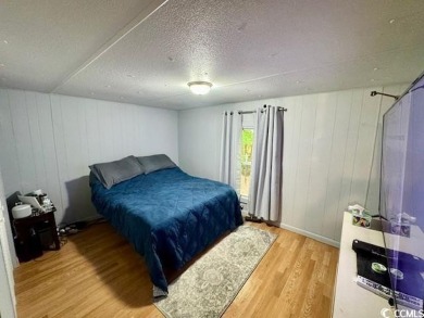 Looking for an affordable beach getaway or primary residence on Indian Wells Golf Course in South Carolina - for sale on GolfHomes.com, golf home, golf lot