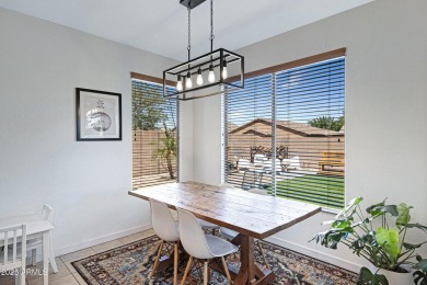 This delightful single-story residence offers 3 spacious on The Golf Club At Johnson Ranch in Arizona - for sale on GolfHomes.com, golf home, golf lot