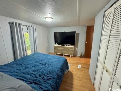 Looking for an affordable beach getaway or primary residence on Indian Wells Golf Course in South Carolina - for sale on GolfHomes.com, golf home, golf lot
