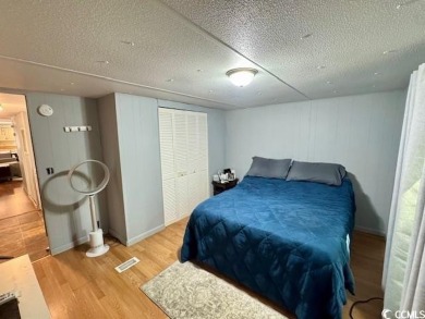 Looking for an affordable beach getaway or primary residence on Indian Wells Golf Course in South Carolina - for sale on GolfHomes.com, golf home, golf lot
