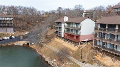 WHAT A VIEW! You feel like you are on the edge of the water on Seasons Ridge At Four Seasons in Missouri - for sale on GolfHomes.com, golf home, golf lot