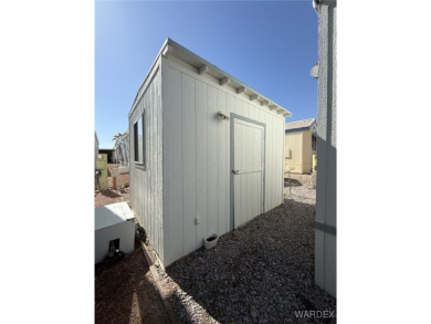 Charming home with versatile Arizona room has a completely on Riverview Golf Course in Arizona - for sale on GolfHomes.com, golf home, golf lot