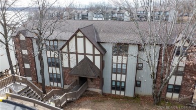 WHAT A VIEW! You feel like you are on the edge of the water on Seasons Ridge At Four Seasons in Missouri - for sale on GolfHomes.com, golf home, golf lot