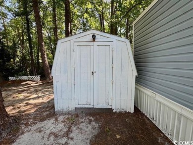 Looking for an affordable beach getaway or primary residence on Indian Wells Golf Course in South Carolina - for sale on GolfHomes.com, golf home, golf lot