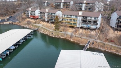 WHAT A VIEW! You feel like you are on the edge of the water on Seasons Ridge At Four Seasons in Missouri - for sale on GolfHomes.com, golf home, golf lot