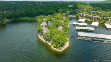 WHAT A VIEW! You feel like you are on the edge of the water on Seasons Ridge At Four Seasons in Missouri - for sale on GolfHomes.com, golf home, golf lot