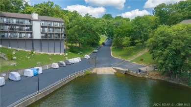 WHAT A VIEW! You feel like you are on the edge of the water on Seasons Ridge At Four Seasons in Missouri - for sale on GolfHomes.com, golf home, golf lot