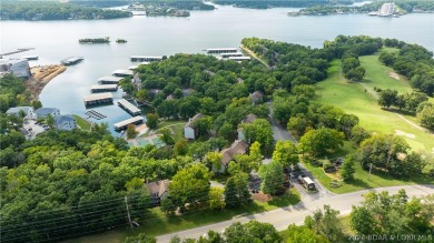 WHAT A VIEW! You feel like you are on the edge of the water on Seasons Ridge At Four Seasons in Missouri - for sale on GolfHomes.com, golf home, golf lot