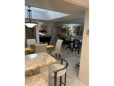 EXPERIENCE THE LUXURY LIVING IN THIS LARGE AND CAPTIVATING 2 BED on Jim McLean Signature Course in Florida - for sale on GolfHomes.com, golf home, golf lot