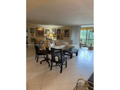 EXPERIENCE THE LUXURY LIVING IN THIS LARGE AND CAPTIVATING 2 BED on Jim McLean Signature Course in Florida - for sale on GolfHomes.com, golf home, golf lot