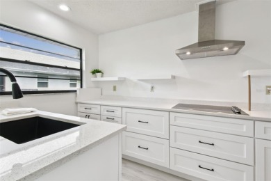 Welcome to this beautifully updated 2-bedroom + office/3rd on Caloosa Greens Executive Golf Course in Florida - for sale on GolfHomes.com, golf home, golf lot