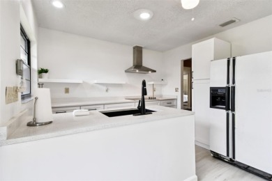 Welcome to this beautifully updated 2-bedroom + office/3rd on Caloosa Greens Executive Golf Course in Florida - for sale on GolfHomes.com, golf home, golf lot