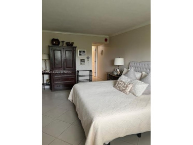 EXPERIENCE THE LUXURY LIVING IN THIS LARGE AND CAPTIVATING 2 BED on Jim McLean Signature Course in Florida - for sale on GolfHomes.com, golf home, golf lot