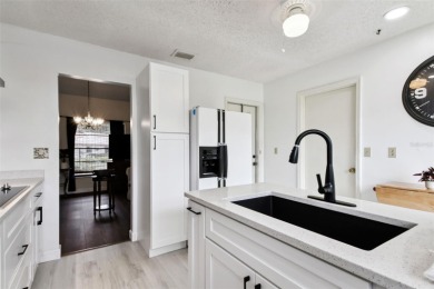 Welcome to this beautifully updated 2-bedroom + office/3rd on Caloosa Greens Executive Golf Course in Florida - for sale on GolfHomes.com, golf home, golf lot