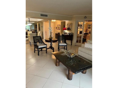 EXPERIENCE THE LUXURY LIVING IN THIS LARGE AND CAPTIVATING 2 BED on Jim McLean Signature Course in Florida - for sale on GolfHomes.com, golf home, golf lot