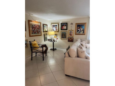 EXPERIENCE THE LUXURY LIVING IN THIS LARGE AND CAPTIVATING 2 BED on Jim McLean Signature Course in Florida - for sale on GolfHomes.com, golf home, golf lot