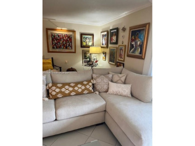 EXPERIENCE THE LUXURY LIVING IN THIS LARGE AND CAPTIVATING 2 BED on Jim McLean Signature Course in Florida - for sale on GolfHomes.com, golf home, golf lot