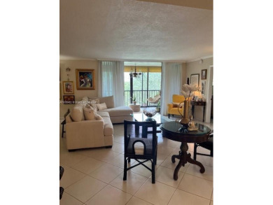 EXPERIENCE THE LUXURY LIVING IN THIS LARGE AND CAPTIVATING 2 BED on Jim McLean Signature Course in Florida - for sale on GolfHomes.com, golf home, golf lot