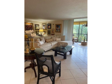 EXPERIENCE THE LUXURY LIVING IN THIS LARGE AND CAPTIVATING 2 BED on Jim McLean Signature Course in Florida - for sale on GolfHomes.com, golf home, golf lot