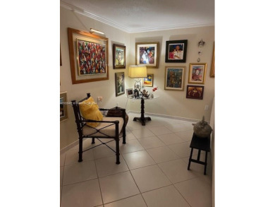 EXPERIENCE THE LUXURY LIVING IN THIS LARGE AND CAPTIVATING 2 BED on Jim McLean Signature Course in Florida - for sale on GolfHomes.com, golf home, golf lot