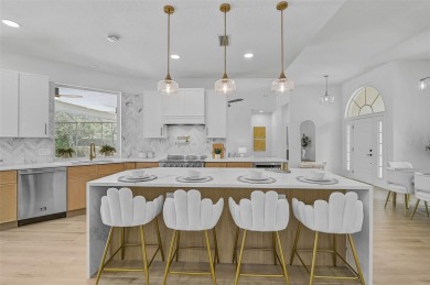 Welcome to your dream home in the highly desirable gated Calusa on Calusa Lakes Golf Club in Florida - for sale on GolfHomes.com, golf home, golf lot