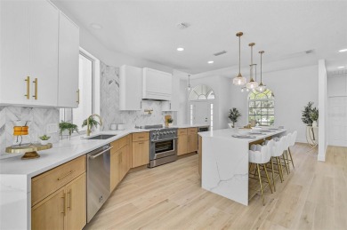 Welcome to your dream home in the highly desirable gated Calusa on Calusa Lakes Golf Club in Florida - for sale on GolfHomes.com, golf home, golf lot