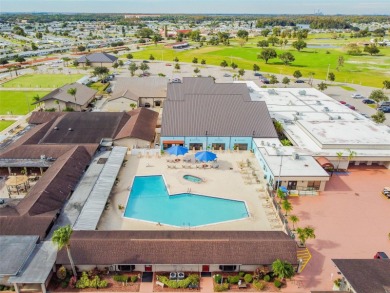 Welcome to this beautifully updated 2-bedroom + office/3rd on Caloosa Greens Executive Golf Course in Florida - for sale on GolfHomes.com, golf home, golf lot