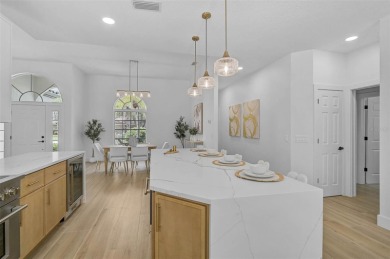 Welcome to your dream home in the highly desirable gated Calusa on Calusa Lakes Golf Club in Florida - for sale on GolfHomes.com, golf home, golf lot
