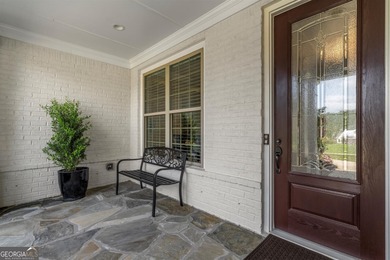 If you ever wanted to live in an elegant model home with on The Governors Towne Club in Georgia - for sale on GolfHomes.com, golf home, golf lot