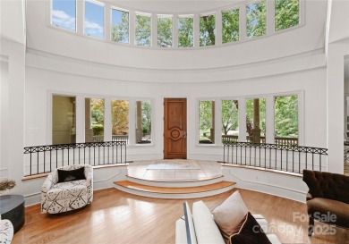 Escape to this sleek 5 bed, 4.5 bath two story contemporary home on Carmel Country Club in North Carolina - for sale on GolfHomes.com, golf home, golf lot