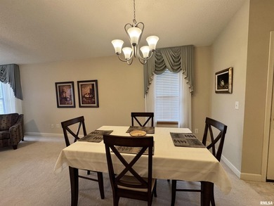 This duplex is located on fairway 15 at the Macomb Country Club on Macomb Country Club in Illinois - for sale on GolfHomes.com, golf home, golf lot