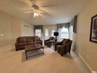 This duplex is located on fairway 15 at the Macomb Country Club on Macomb Country Club in Illinois - for sale on GolfHomes.com, golf home, golf lot