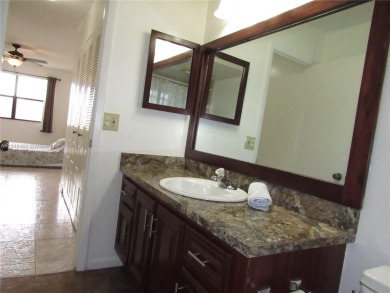 Remodeled corner apartment in luxurious Sunrise lakes, One of on Sunrise Lakes Phase IV Golf Course in Florida - for sale on GolfHomes.com, golf home, golf lot