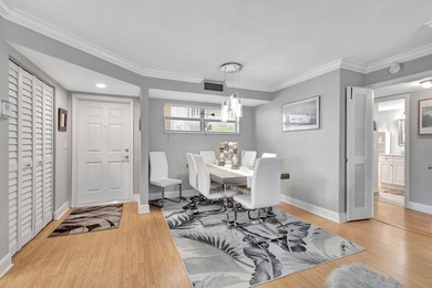 Live the coastal lifestyle! This beautifully updated on The Little Club in Florida - for sale on GolfHomes.com, golf home, golf lot