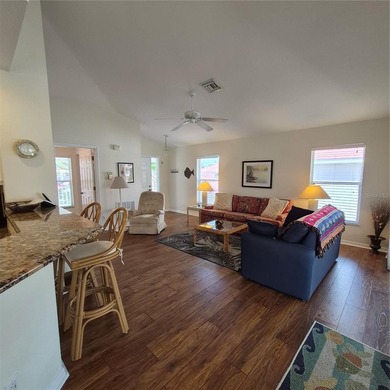 Discover refined Florida living in this beautifully appointed on Riverwood Golf Club in Florida - for sale on GolfHomes.com, golf home, golf lot