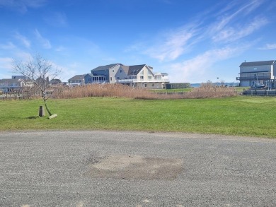 Looking for breathtaking views of the Chincoteague Bay, a front on Captains Cove Golf and Yacht Club in Virginia - for sale on GolfHomes.com, golf home, golf lot