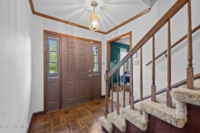 Welcome to this spacious 4-bedroom, 2-bath home in the on Harbour Point Golf Club in North Carolina - for sale on GolfHomes.com, golf home, golf lot
