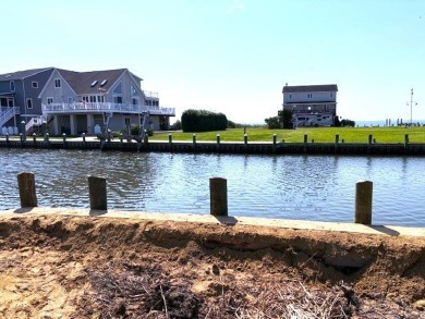 Looking for breathtaking views of the Chincoteague Bay, a front on Captains Cove Golf and Yacht Club in Virginia - for sale on GolfHomes.com, golf home, golf lot