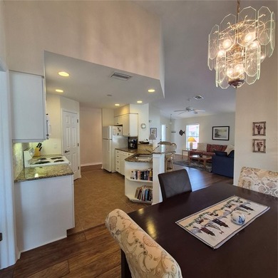 Discover refined Florida living in this beautifully appointed on Riverwood Golf Club in Florida - for sale on GolfHomes.com, golf home, golf lot