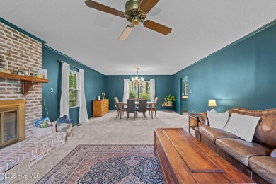 Welcome to this spacious 4-bedroom, 2-bath home in the on Harbour Point Golf Club in North Carolina - for sale on GolfHomes.com, golf home, golf lot