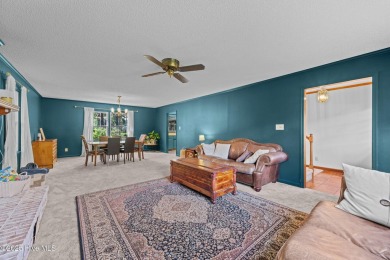 Welcome to this spacious 4-bedroom, 2-bath home in the on Harbour Point Golf Club in North Carolina - for sale on GolfHomes.com, golf home, golf lot