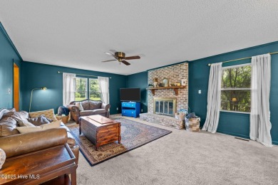 Welcome to this spacious 4-bedroom, 2-bath home in the on Harbour Point Golf Club in North Carolina - for sale on GolfHomes.com, golf home, golf lot