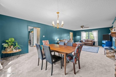 Welcome to this spacious 4-bedroom, 2-bath home in the on Harbour Point Golf Club in North Carolina - for sale on GolfHomes.com, golf home, golf lot