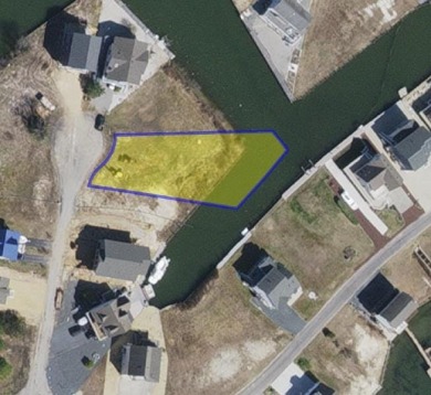 Looking for breathtaking views of the Chincoteague Bay, a front on Captains Cove Golf and Yacht Club in Virginia - for sale on GolfHomes.com, golf home, golf lot