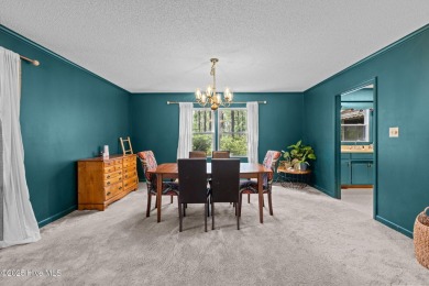 Welcome to this spacious 4-bedroom, 2-bath home in the on Harbour Point Golf Club in North Carolina - for sale on GolfHomes.com, golf home, golf lot