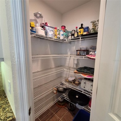 Discover refined Florida living in this beautifully appointed on Riverwood Golf Club in Florida - for sale on GolfHomes.com, golf home, golf lot