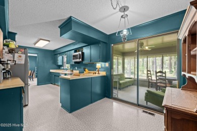 Welcome to this spacious 4-bedroom, 2-bath home in the on Harbour Point Golf Club in North Carolina - for sale on GolfHomes.com, golf home, golf lot
