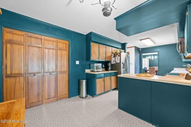 Welcome to this spacious 4-bedroom, 2-bath home in the on Harbour Point Golf Club in North Carolina - for sale on GolfHomes.com, golf home, golf lot