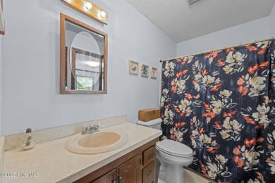 Welcome to this spacious 4-bedroom, 2-bath home in the on Harbour Point Golf Club in North Carolina - for sale on GolfHomes.com, golf home, golf lot