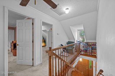 Welcome to this spacious 4-bedroom, 2-bath home in the on Harbour Point Golf Club in North Carolina - for sale on GolfHomes.com, golf home, golf lot